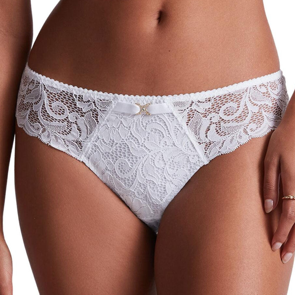 Model wearing 'Mon Bijou' White Brazilian Brief, by Aubade.