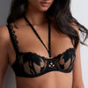 Model wearing 'Night at Paradise' Black Half Cup Bra, by (front view, close up).