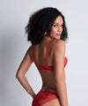 Model wearing 'Rules of Attraction' Red bra and Italian Brief, by Aubade (back view).