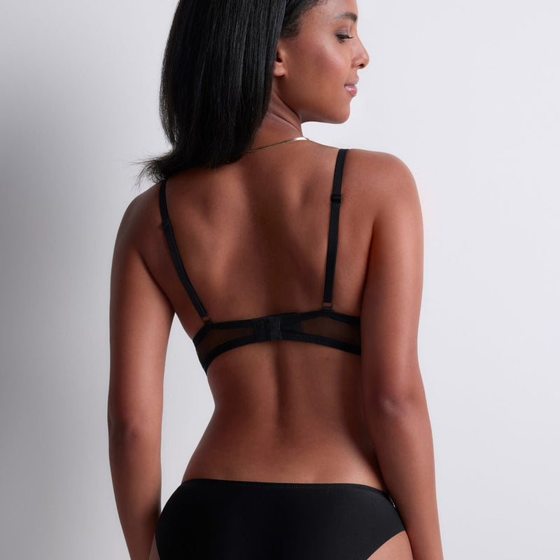 Model wearing 'Sheer Emotion' Black Brazilian Brief, by Aubade (back view).