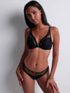 Model wearing 'Sheer Emotion' Black Bralette, by Aubade (front view).