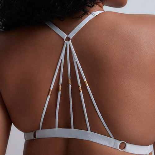 Model wearing 'Vibes' White Triangle Bralette, by Aubade (back view, close-up).