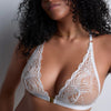 Model wearing 'Vibes' White Triangle Bralette, by Aubade (front view, close-up).