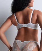 Model wearing 'Vibes' Pearl White Shoulder Full Cup Bra, by Aubade (back view).