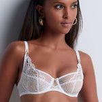 Model wearing 'Vibes' Pearl White Shoulder Full Cup Bra, by Aubade (front view).