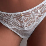 Model wearing 'Vibes' White Tanga, by Aubade (front view, close-up, detail).