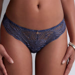 Model wearing 'Vibes' Denim Blue Italian Brief, by Aubade (front view, close up).