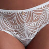 Model wearing 'Vibes' White Italian Brief, by Aubade (front view, detail).