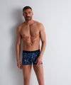 Model wearing 'Blue Flower' Men's Boxer Short, by Aubade (front view).