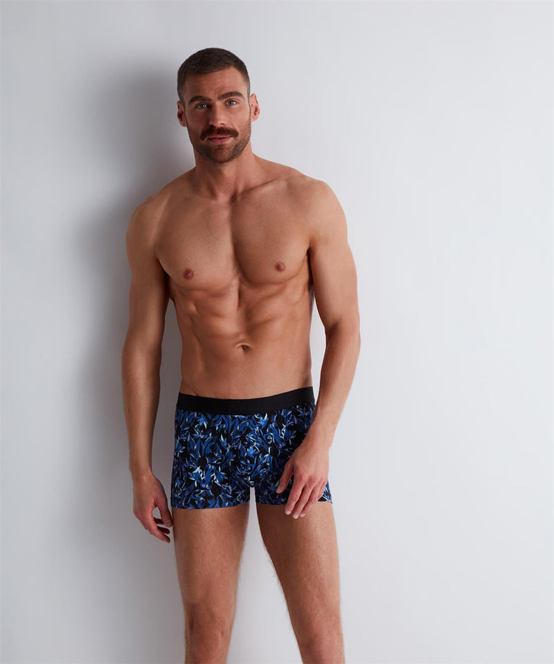 Model wearing 'Blue Flower' Men's Boxer Short, by Aubade (front view).