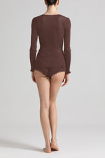 Model wearing 'Bianca' Brown Long-Sleeved Wool and Silk Top, by Boglietti (back view).