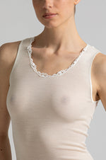 Model wearing 'Basilia' Ivory Warm and Breathable T-Shirt, by Boglietti (front view, close up).