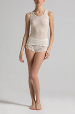 Model wearing 'Basilia' Ivory Warm and Breathable T-Shirt, by Boglietti (front view).