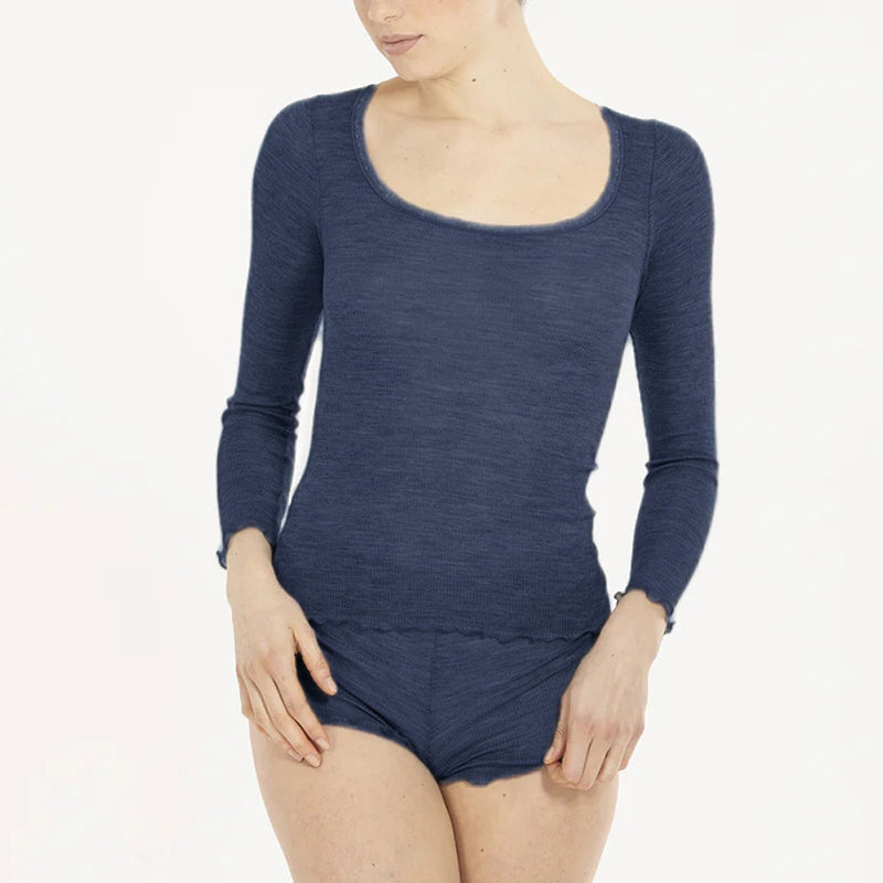 Model wearing 'Orosei' Navy Blue Long-Sleeved Tank Top, by Boglietti (front view).