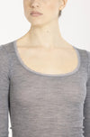 Model wearing 'Orosei' Light Grey Long-Sleeved Top, by Boglietti (front view, close up).