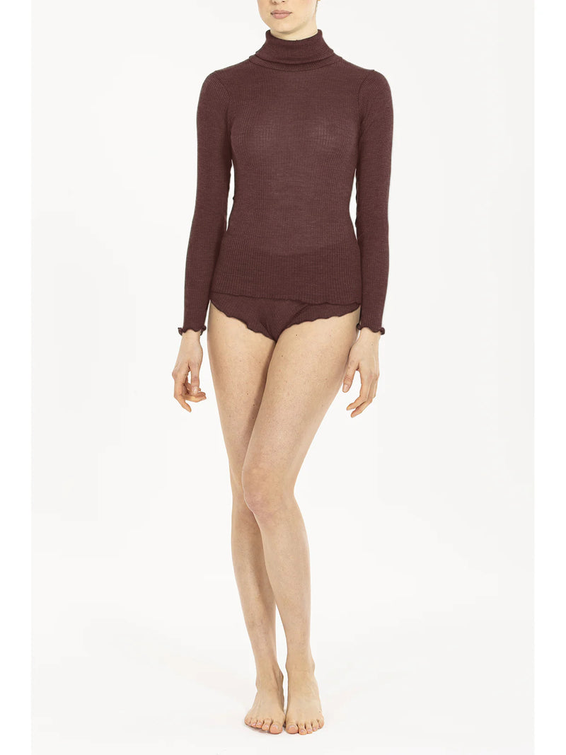 Model wearing 'Star' Brown Long-Sleeved Turtleneck, by Boglietti (front view).