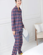 Model wearing Women's Brushed Cotton Arran Tartan Pyjama Set, by British Boxers (side view).