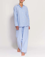 Model wearing Women's Brushed Cotton Westwood Blue Stripe Pyjama Set, by British Boxers (front view).