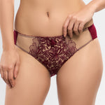 Model wearing 'Agathe' Amarante (Burgundy) Brief, by Empreinte (front view, close up).