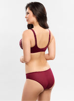 Model wearing 'Agathe' Amarante (Burgundy) Full Cup Bra, by Empreinte (side view).