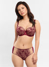 Model wearing Empreinte 'Agathe' (Burgundy) Low-Necked Bra, by Amarante (front view).