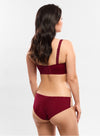 Model wearing 'Agathe' Amarante (Burgundy) Bustier, by Empreinte (back view).