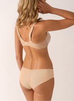 Model wearing 'Agathe' Ivoire (Beige) Shorty, Empreinte (back view).