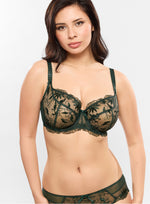 Model wearing 'Anouk' Emerald Green Low-Necked Bra, by Empreinte (front view).