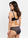 Model wearing 'Cassiopée' Navy Seamless Full Cup Bra, by Empreinte (back view).