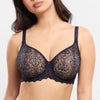 Model wearing 'Cassiopée' Navy Seamless Full Cup Bra, by Empreinte (front view, close up).