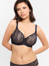 Model wearing 'Cassiopée' Navy Seamless Full Cup Bra, by Empreinte (front view).