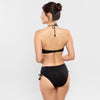 Model wearing 'Jetset' Black Halterneck Bikini Set, by Empreinte (back view).