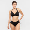 Model wearing 'Jetset' Black Halterneck Bikini Set, by Empreinte (front view).