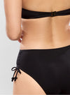 Model wearing 'Jetset' Black Halterneck Bikini Set, by Empreinte (back view, close up of brief).