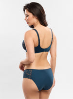 Model wearing 'Leia' Ocean Blue Brief, by Empreinte (back view).