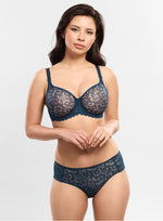 Model wearing 'Leia' Ocean Blue Brief, by Empreinte (front view).