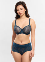 Model wearing 'Leia' Ocean Blue Panty, by Empreinte (front view).