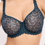 Model wearing 'Leia' Blue Invisible Full Cup Bra, by Empreinte (front view, close up).
