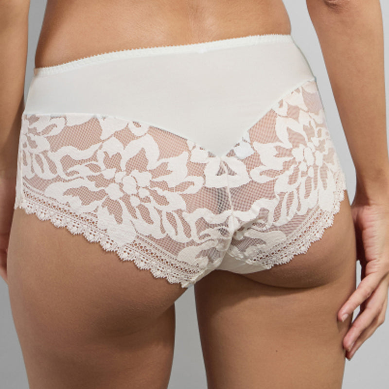 Model wearing 'Leia' Pale Cream Panty, by Empreinte (back view, close-up).