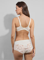 Model wearing 'Leia' Pale Cream Panty, by Empreinte (back view).