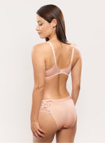 Model wearing 'Leia' Pale Pink Brief, by Empreinte (back view.