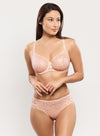 Model wearing 'Leia' Pale Pink Brief, by Empreinte (front view).