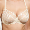 Model wearing 'Tess' Cream Low-Necked Bra, by Empreinte (front view, close-up).