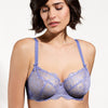 Model wearing 'Tess' Fleur de Lin Low-Necked Bra, by Empreinte (front view).