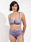 Model wearing 'Tess' Fleur de Lin Low-Necked Bra, by Empreinte (front view).