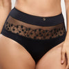 Model wearing 'Tess' Panty in Black, by Empreinte (front view).