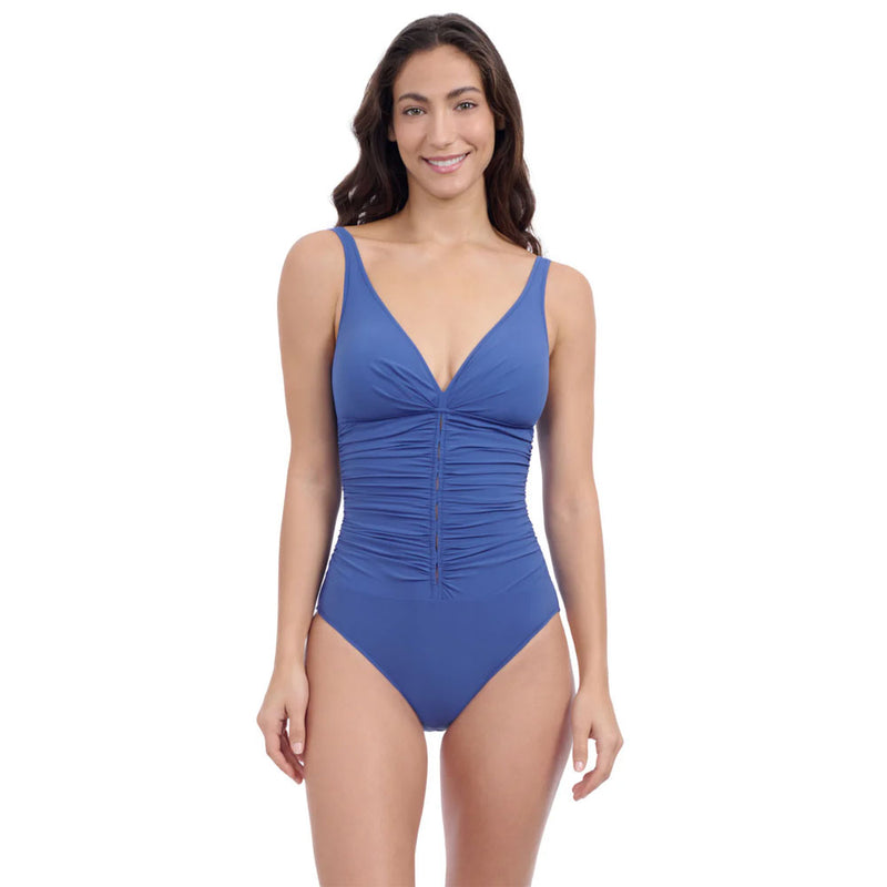 Model wearing 'Profile' Denim Blue V-Neck Swimsuit by Gottex (front view).