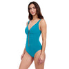 Model wearing 'Profile' Jade Green Gold-Beaded V-Neck Swimsuit, by Gottex  (side view).