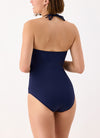 Model wearing 'Venezia' Navy Blue Bandeau/Halterneck Swimsuit, by Janine Robin (back view).