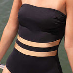 Model wearing Janine Robin 'Venezia' Black Bandeau Swimsuit (detail).